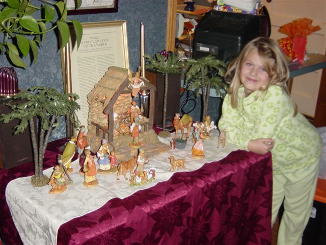 Rachel at about five years-old with our Nativity creche
