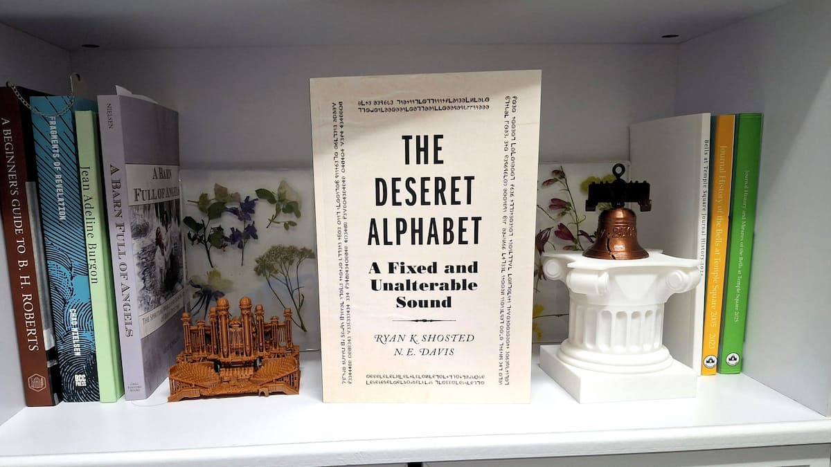 The Deseret Alphabet: A Fixed and Unalterable Sound book cover amongst Mormon-studies related materials.